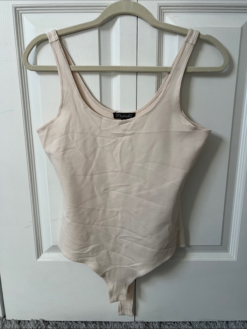 beige bodysuit
